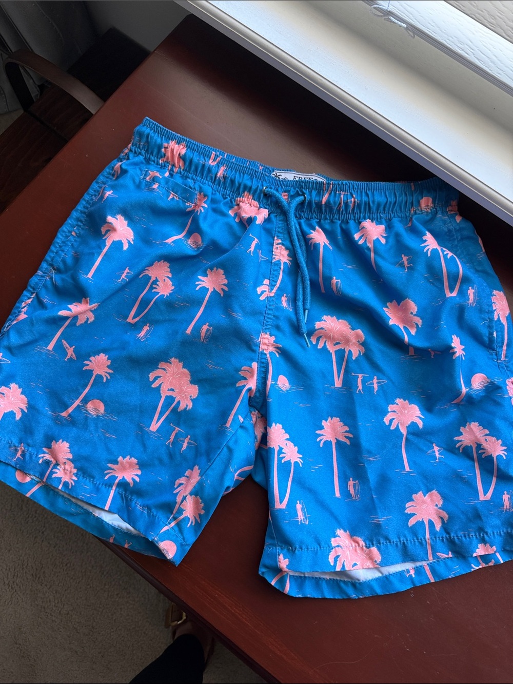 Free Planet Men's Bright Blue Swim Shorts with Pink Palm Print